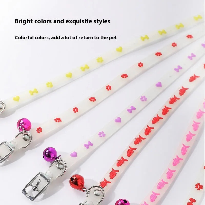 Meow Xinbao glow in the dark adjustable cat collar with metal bell on a silicone chain.