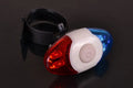 Red and blue dual-colour bicycle tail light with four LED beads on an adjustable mounting bracket.