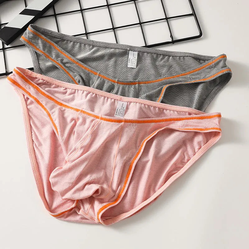 Men's modal butt-lift underwear in ice silk knit, showing colour options: dark gray, pink, yellow green, blue, sky blue.