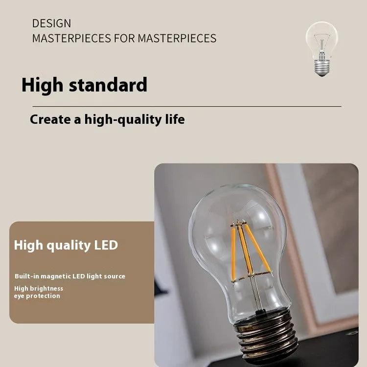 Iron art suspension bulb night lamp on wood grain base with compact 11cm dimensions