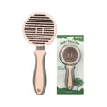 Automatic hair removal comb in green with stainless steel coarse needles, plastic and TPR body on white background
