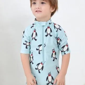 Boys' long sleeve penguin print swimsuit two-piece set with matching swimming cap