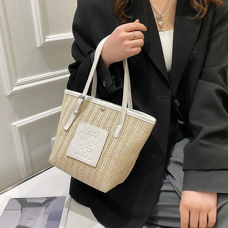 Straw woven women's shoulder bag in white or black with large capacity and retro sewing thread details