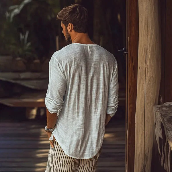 Men's beige V-neck long-sleeved t-shirt in a slim fit laid flat.