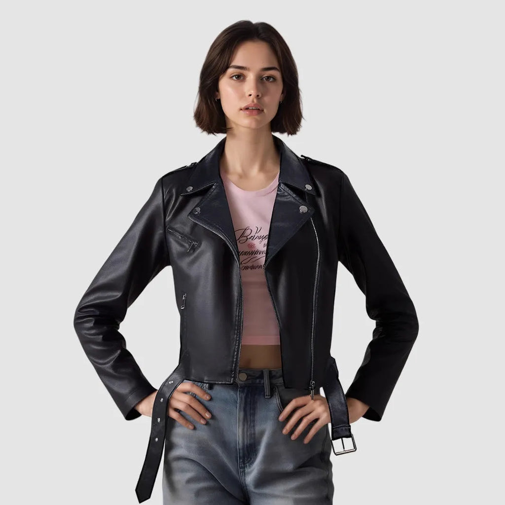Women's black PU leather motorcycle jacket with lapel collar and waist belt on hanger.