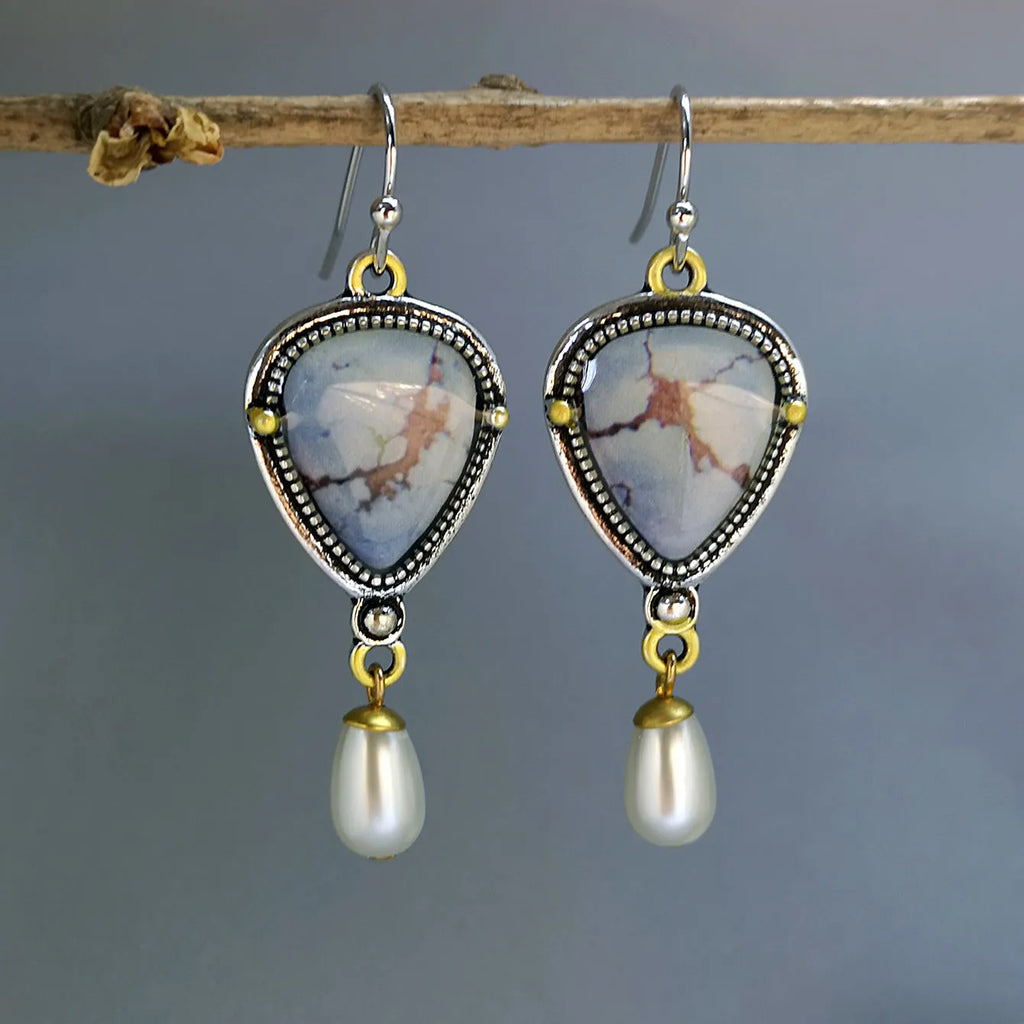 Retro blue electroplated drop earrings with synthetic blue opal and white pearl accents, Bohemian geometric design.