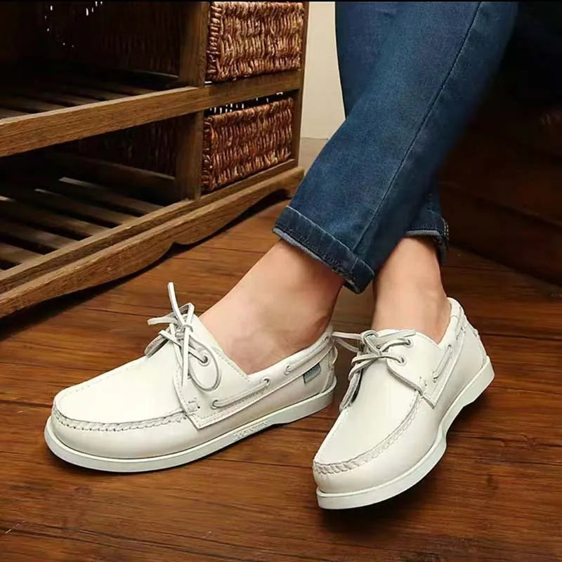 Men's British style casual shoes with artificial PU upper in various colours on a white background.