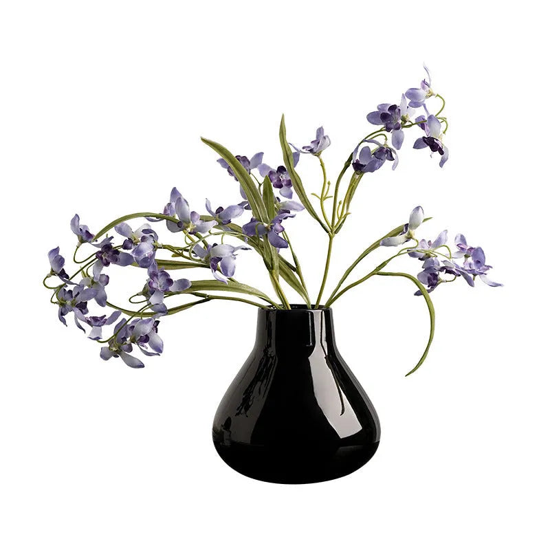 Ceramic decorative vase set with artificial orchid flowers in black or white coloured glaze finish