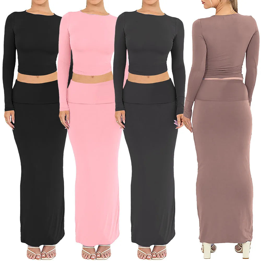 Women's black polyester two-piece autumn suit with sweet style, three-quarter sleeves, and long skirt.
