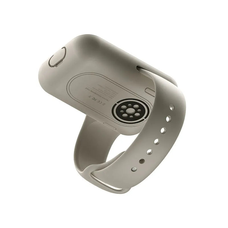 Apple Watch portable wireless charging case with silicone cover, shown next to 44mm watch