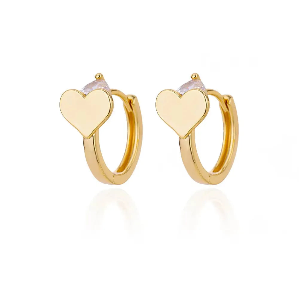 Close-up of women's stainless steel heart-shaped stud earrings with zircon stones and a clip back.