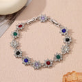 Women's zinc alloy floral bracelet with electroplated finish showing colour variations