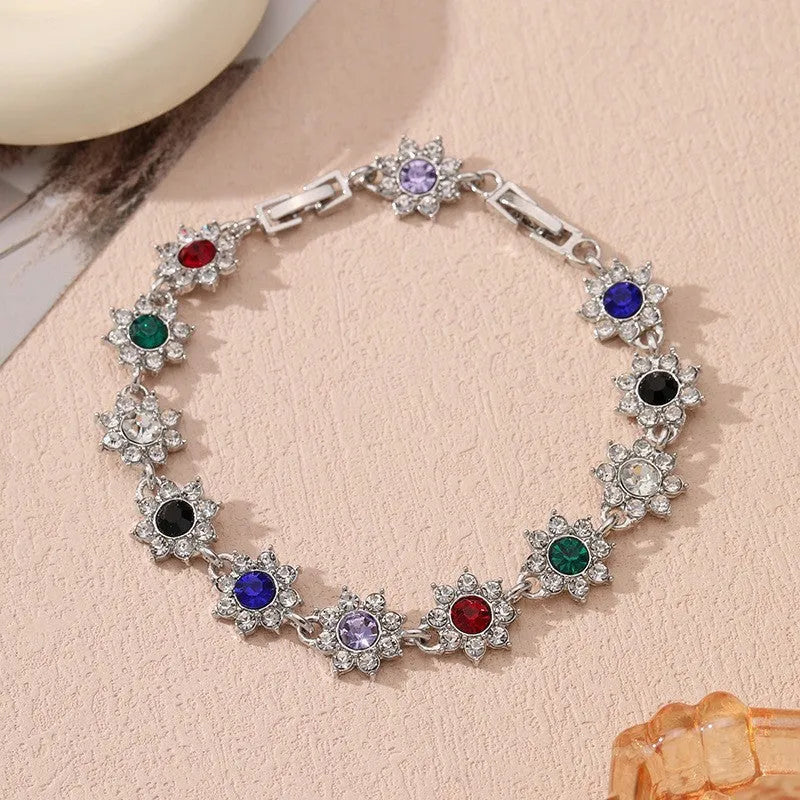 Women's zinc alloy floral bracelet with electroplated finish showing colour variations