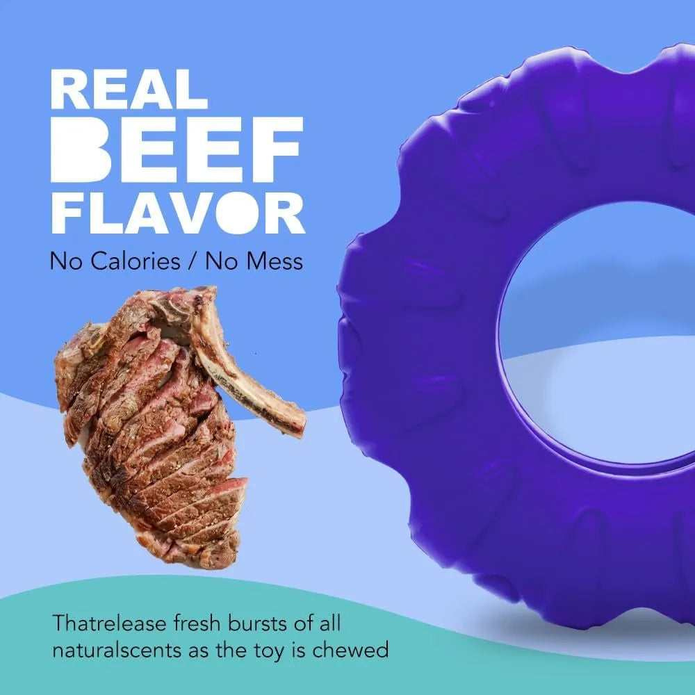 Blue durable natural rubber dog chew toy shaped like a tyre with oval openings.