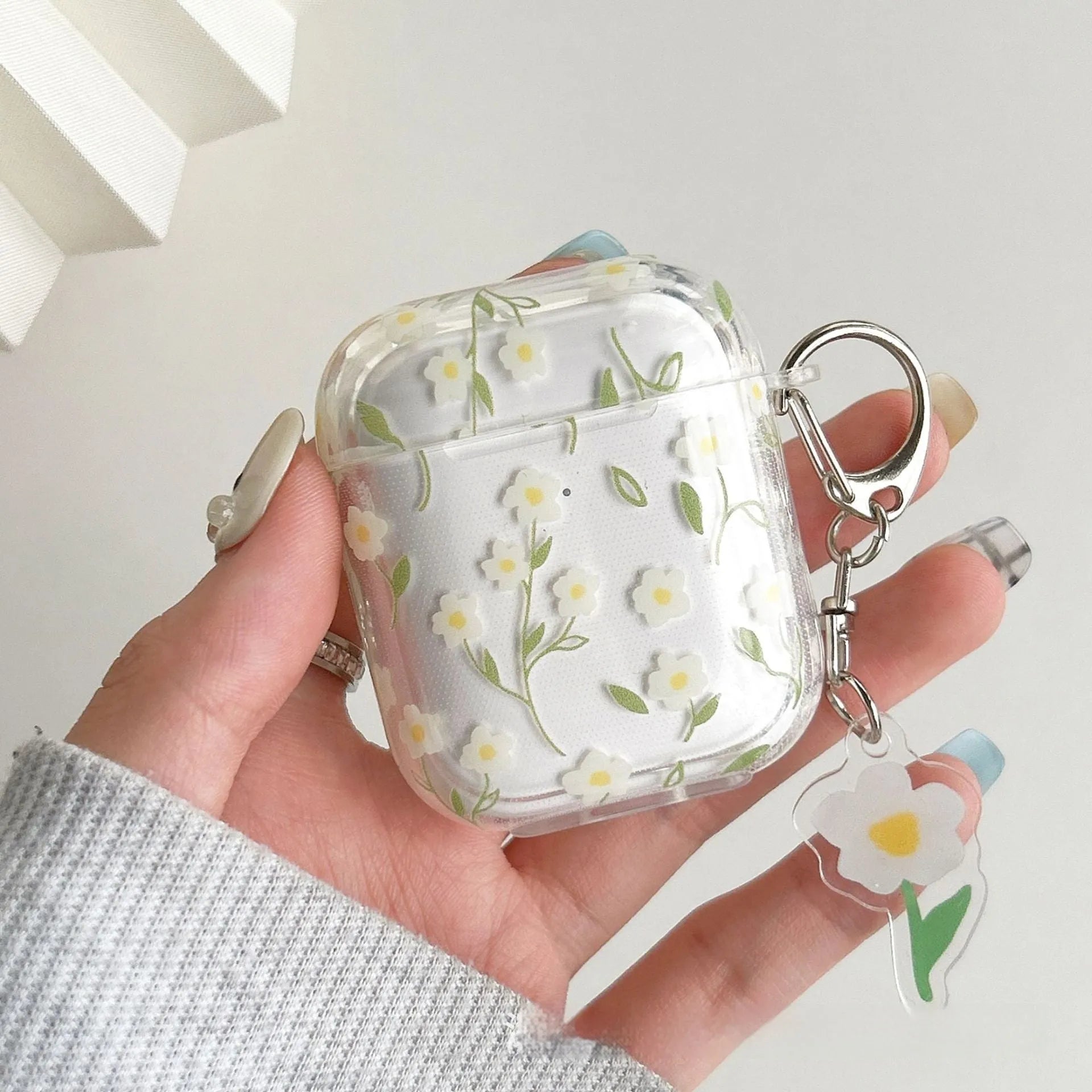 White floral pattern on clear TPU protective case for Apple AirPods