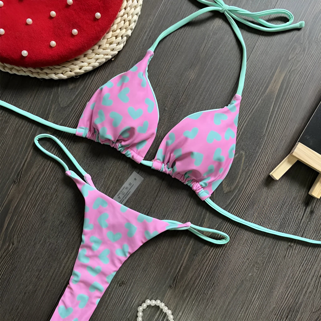 Women's backless split swimsuit with heart printing in nylon and cotton.