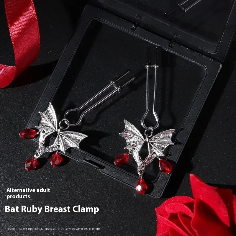 Silver alloy adjustable bat nipple clamp with screw mechanism on white background