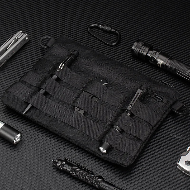 Black oxford cloth outdoor kit bag measuring 18cm by 3.5cm