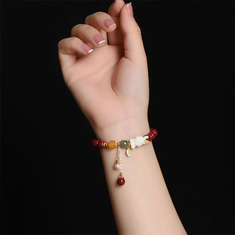 Natural cinnabar rabbit bracelet for women, 8mm or 10mm beads, Tian Yu brand, national style