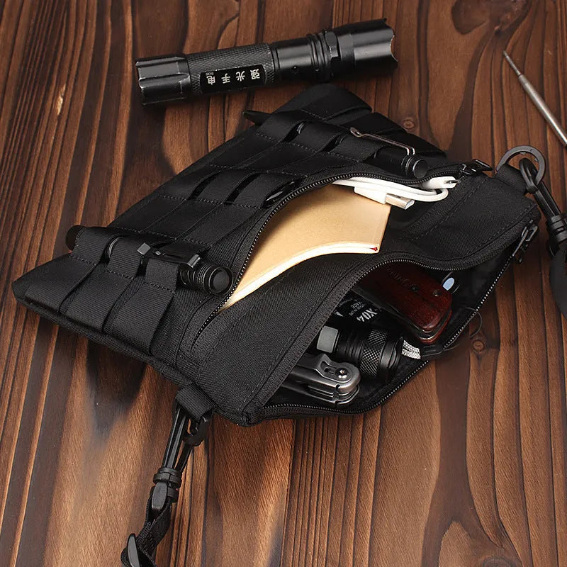 Black oxford cloth outdoor kit bag measuring 18cm by 3.5cm