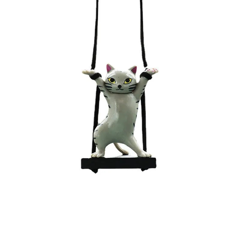 Cartoon-style resin cat pendant on a 25cm rope for hanging from a car rear-view mirror.