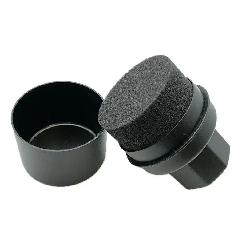 Black and red tyre polishing sponge brushes with PP handles and protective lids on a garage worktop