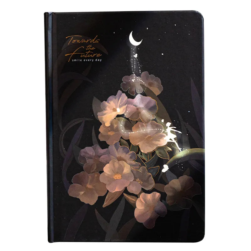 A5 notebook with luminous cover open to show pages with colour illustrations