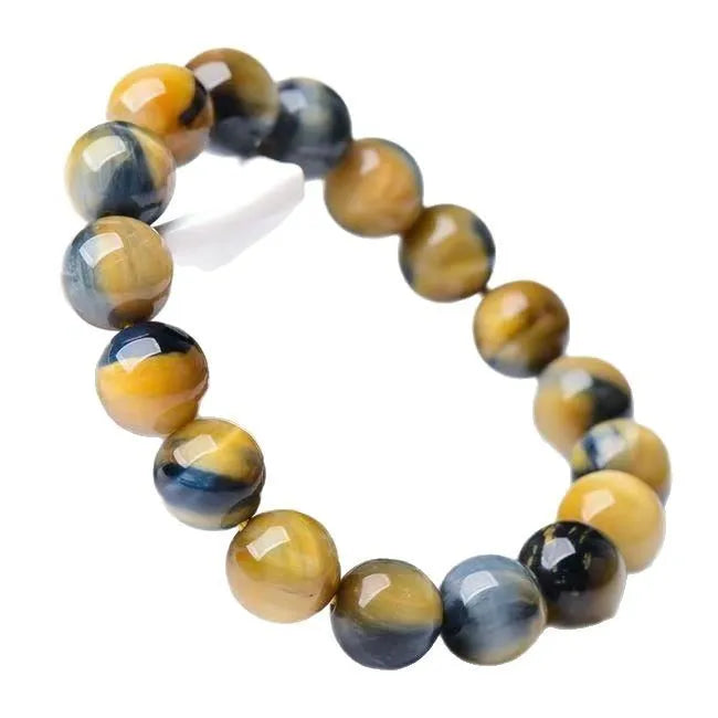 Natural agate fantasy tigereye round bead bracelet on white background, unisex handmade single-circle style
