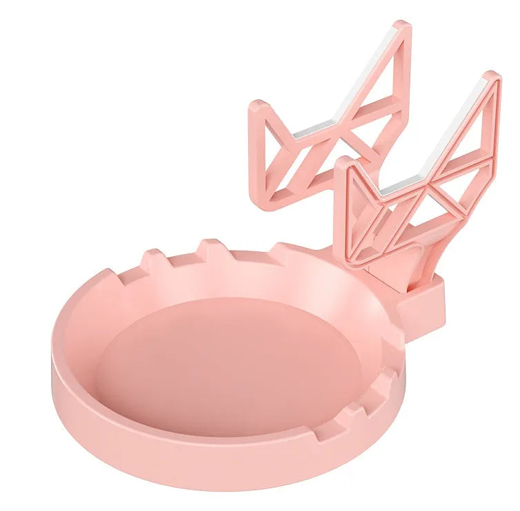Plastic ABS wall-mounted handle rack for organising game controllers, shown in black, white, and pink colour options.