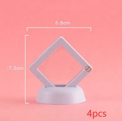 Transparent 3D floating display case holding a coin, with black and white size options