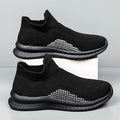 Popcorn Flyknit low-top casual sneaker in a solid colour, showing round toe and fabric upper.