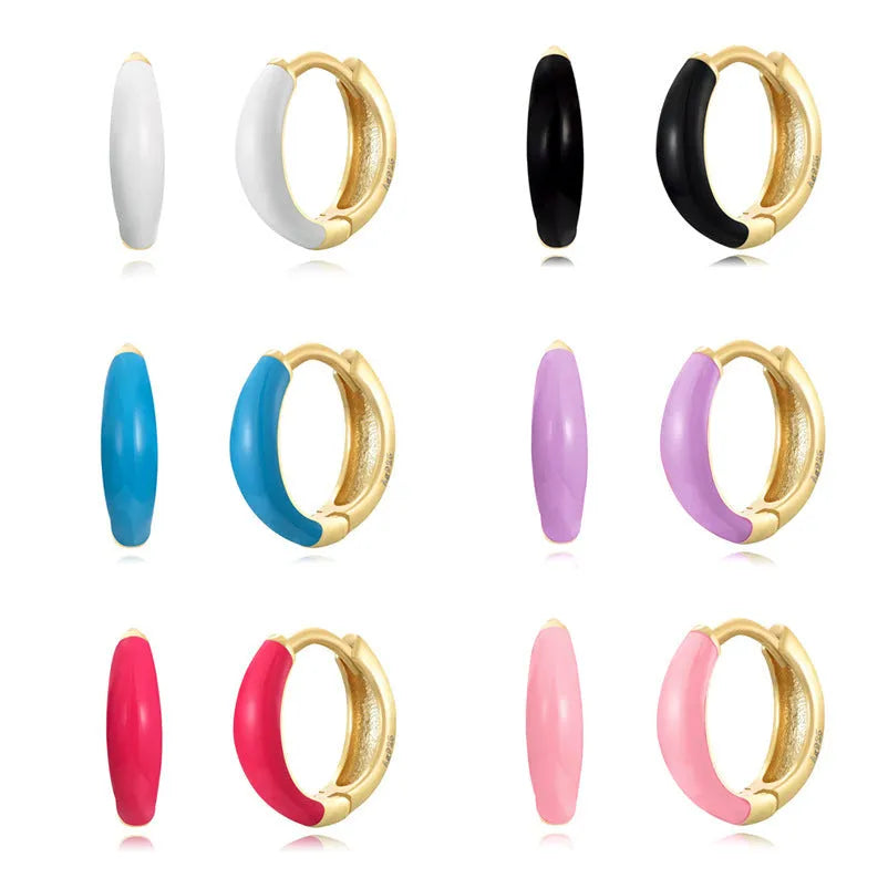 Oval curved epoxy resin earrings with geometric U-shaped design in silver-plated copper