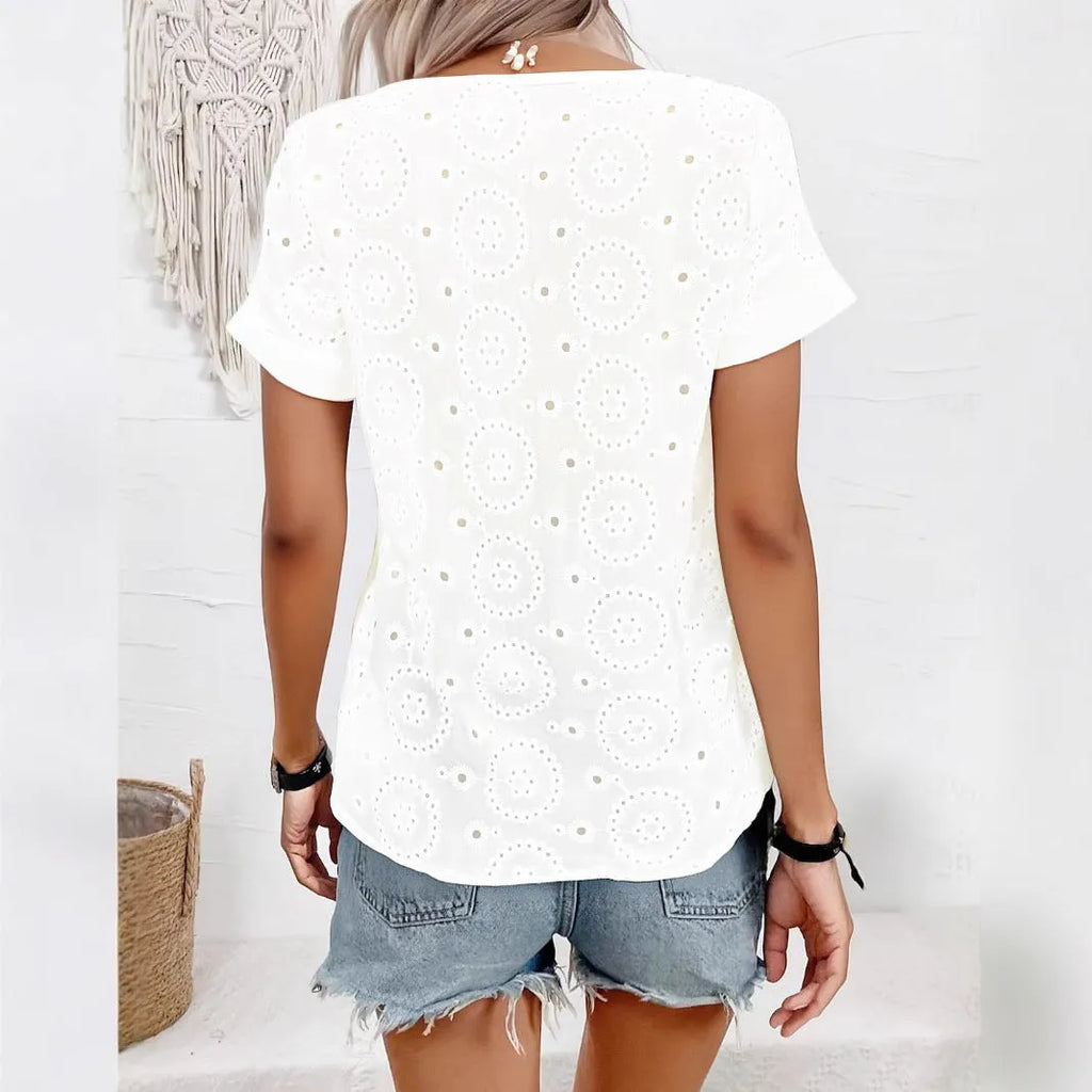 White women's V-neck t-shirt with hollow detailing and loose fit short sleeves