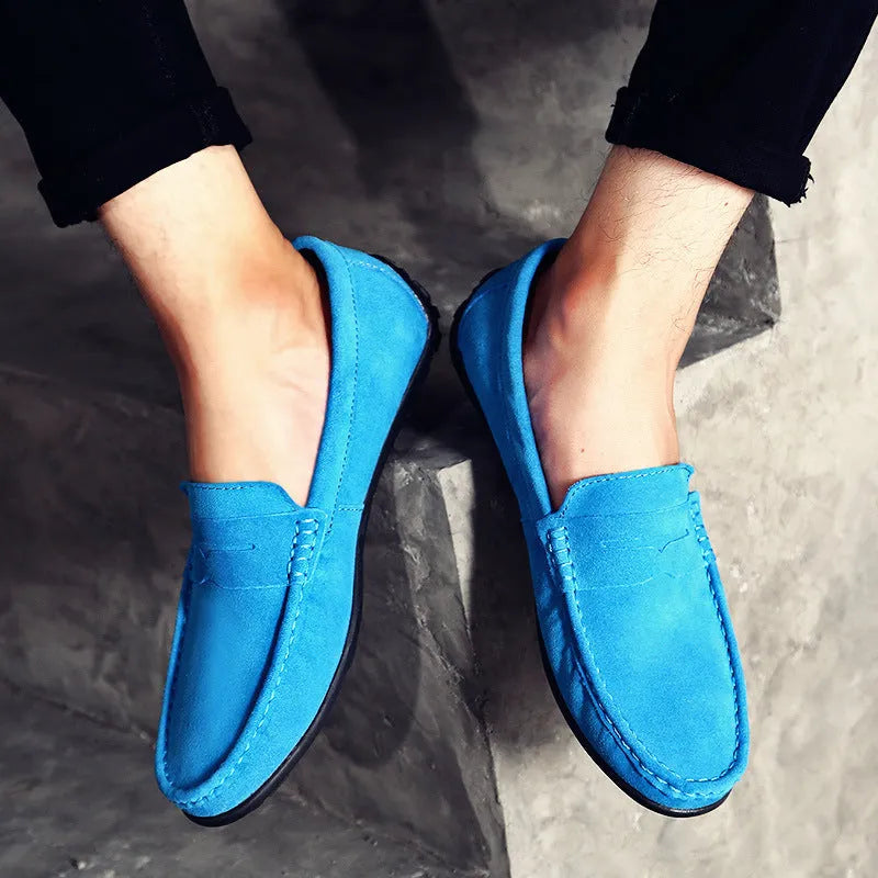 Men's plus size Gommino style casual shoes in suede leather with a round toe and flat rubber sole.