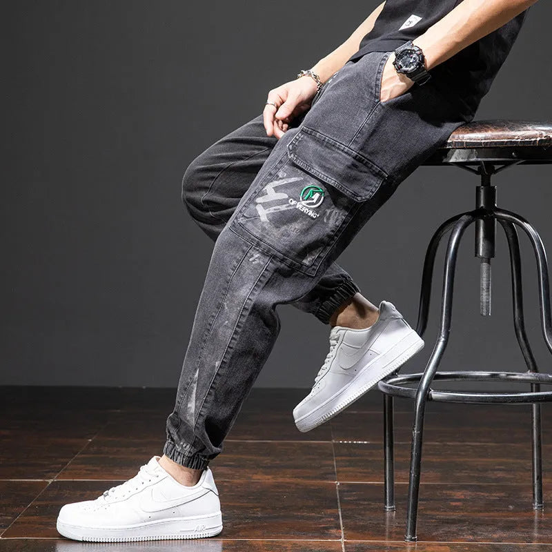 Men's straight leg cargo jeans in blue, showing loose fit, cargo pockets, and mid waist design.