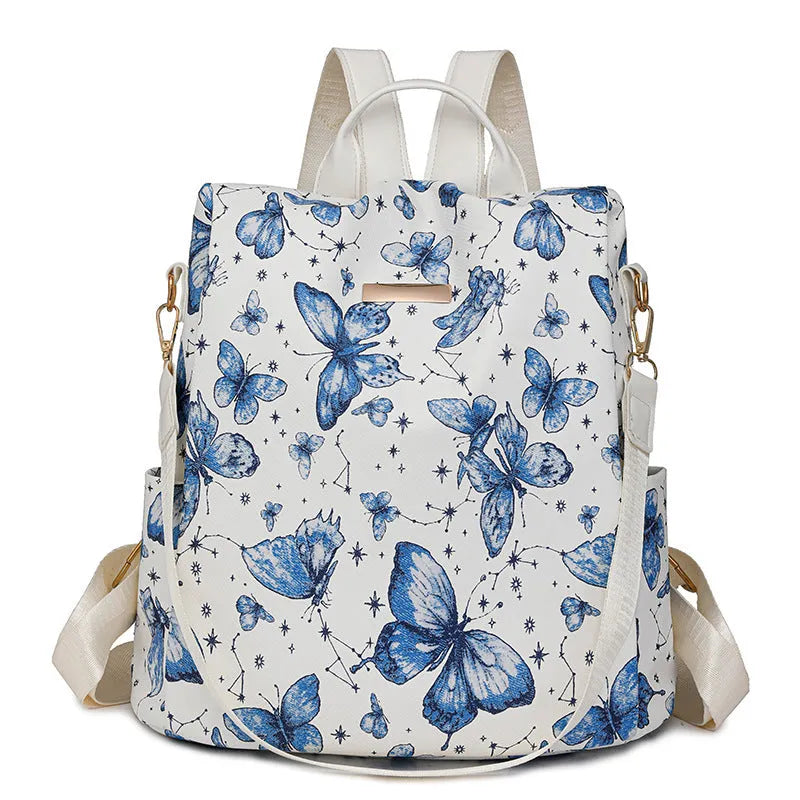 Butterfly printed PU backpack in blue with large capacity shoulder bag design and sewing line detailing