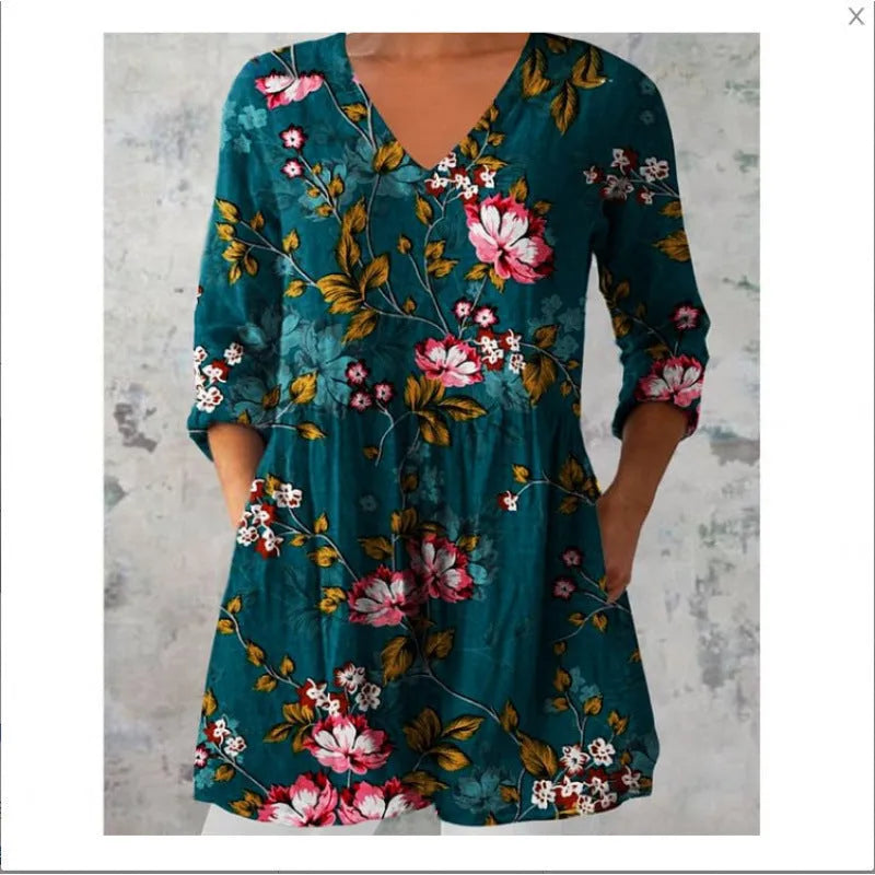 Women's printed loose dress with 3/4 sleeves and a wave skirt, shown in a variety of pattern styles.
