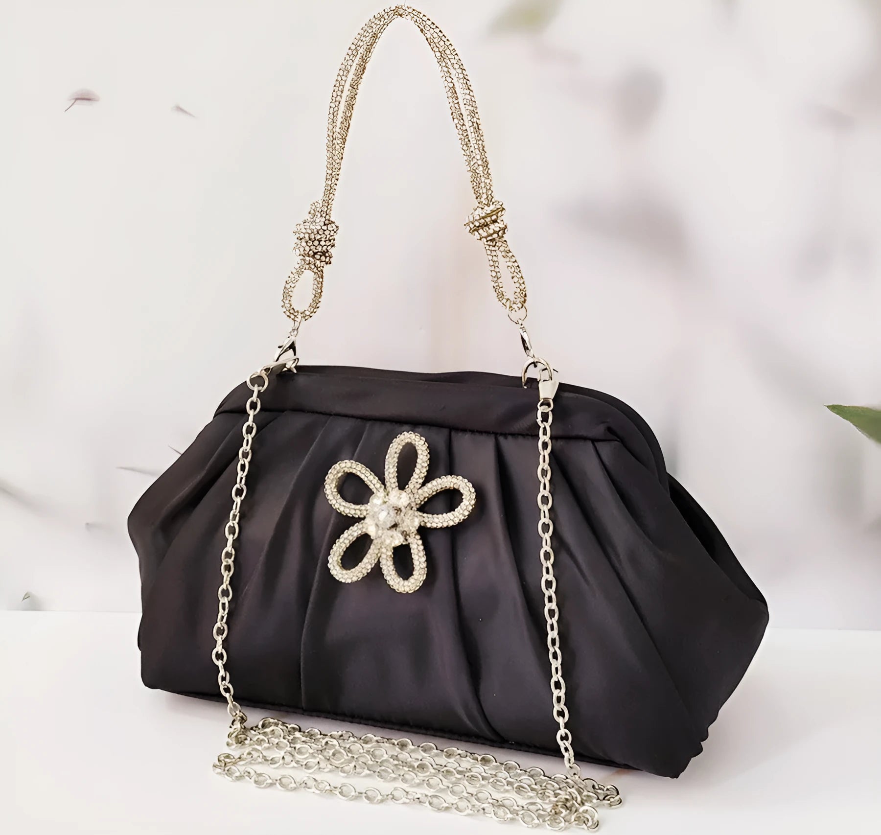 Women's black shell shape crossbody bag with diamond pattern and chain details showing internal document compartment