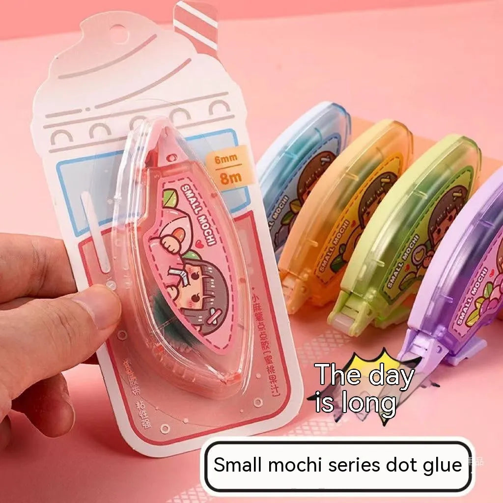 Hand account dotting glue in card packaging showing fruit juice colour variants.