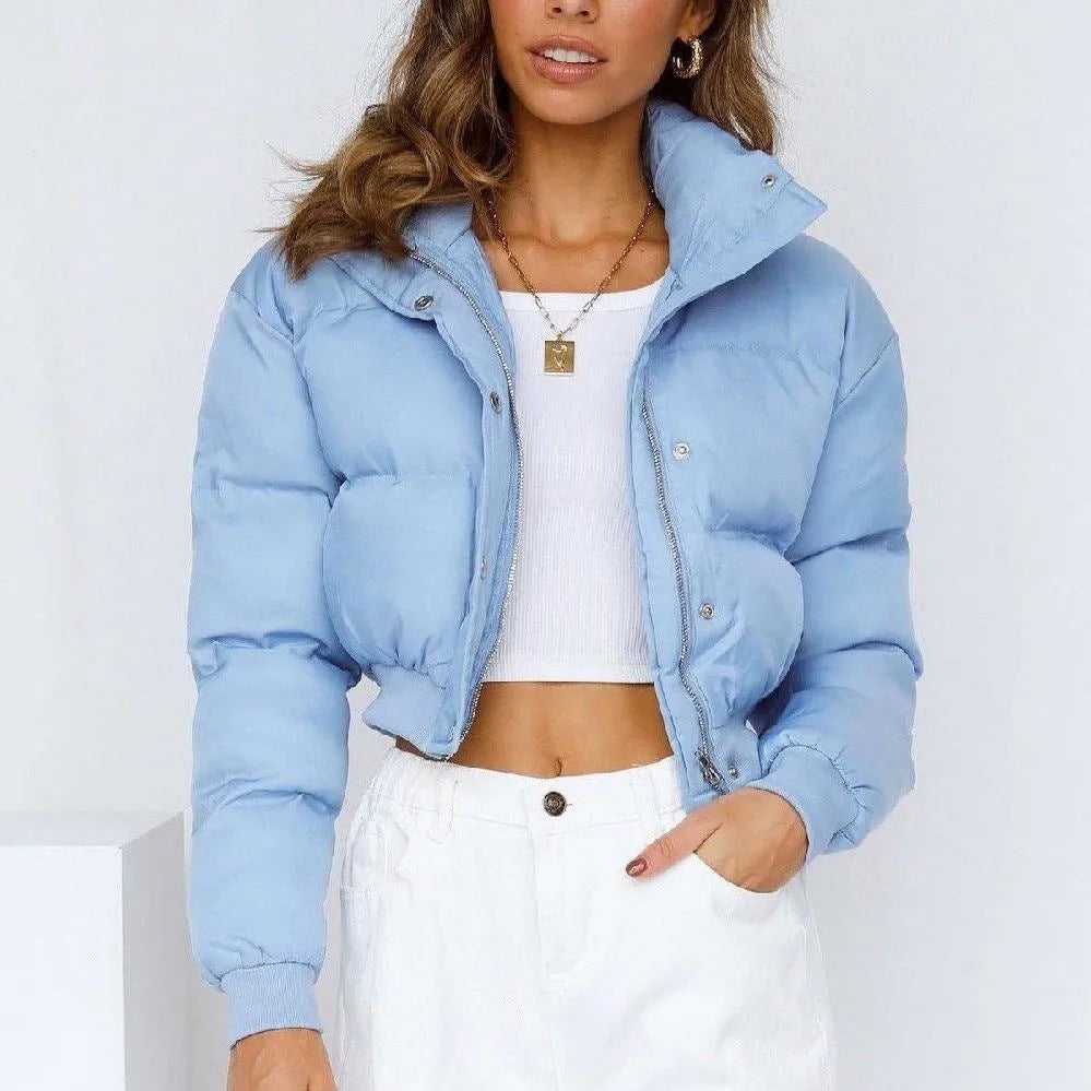 Women's loose polyester jacket in beige, black, blue or milky white colours with regular long sleeves