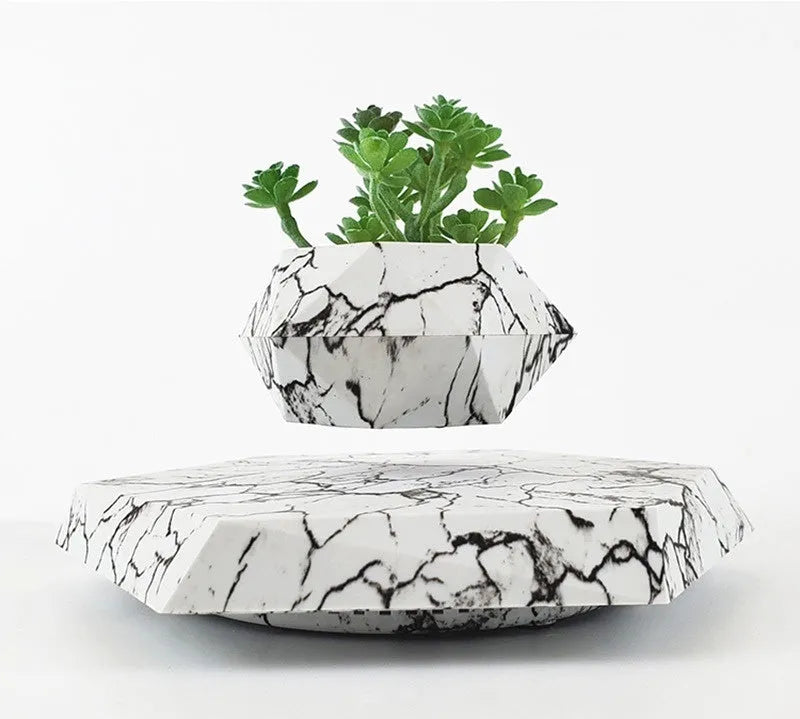 Levitating plant pot marble colour floating with magnetic levitation base