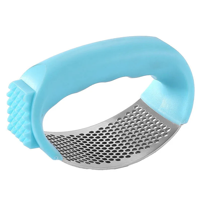 304 stainless steel garlic press 11x7cm in modern simple design on a kitchen counter