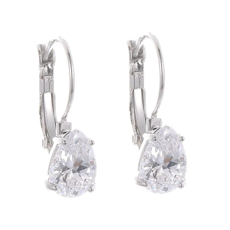 Drop-shaped copper earrings with platinum gem decoration in gold and platinum colour options