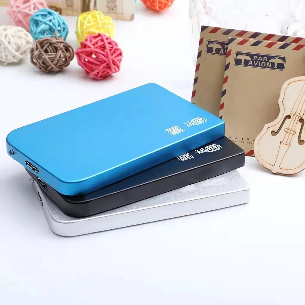 External solid state drive with metal shell in choice of black, blue, red, or silver colours showing USB 3.0 connector