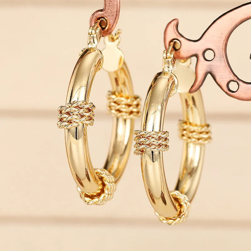 Geometric copper earrings for women with ring and line design in golden finish