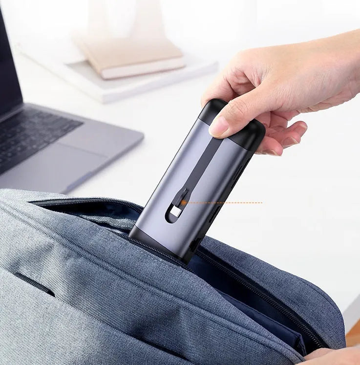 USB-C dock expansion adapter showing HDMI, USB 3.0, and charging ports with included connecting cables