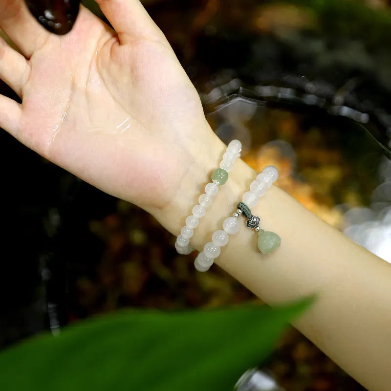 S925 silver bracelet with white agate and Hetian jade lotus design for women
