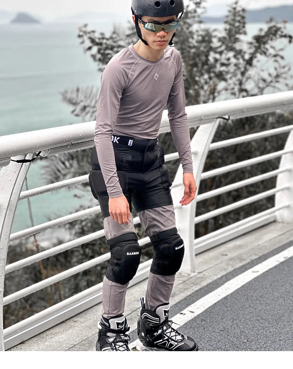 Black roller skating hip pad pants made from spandex and NBR foam for fall protection