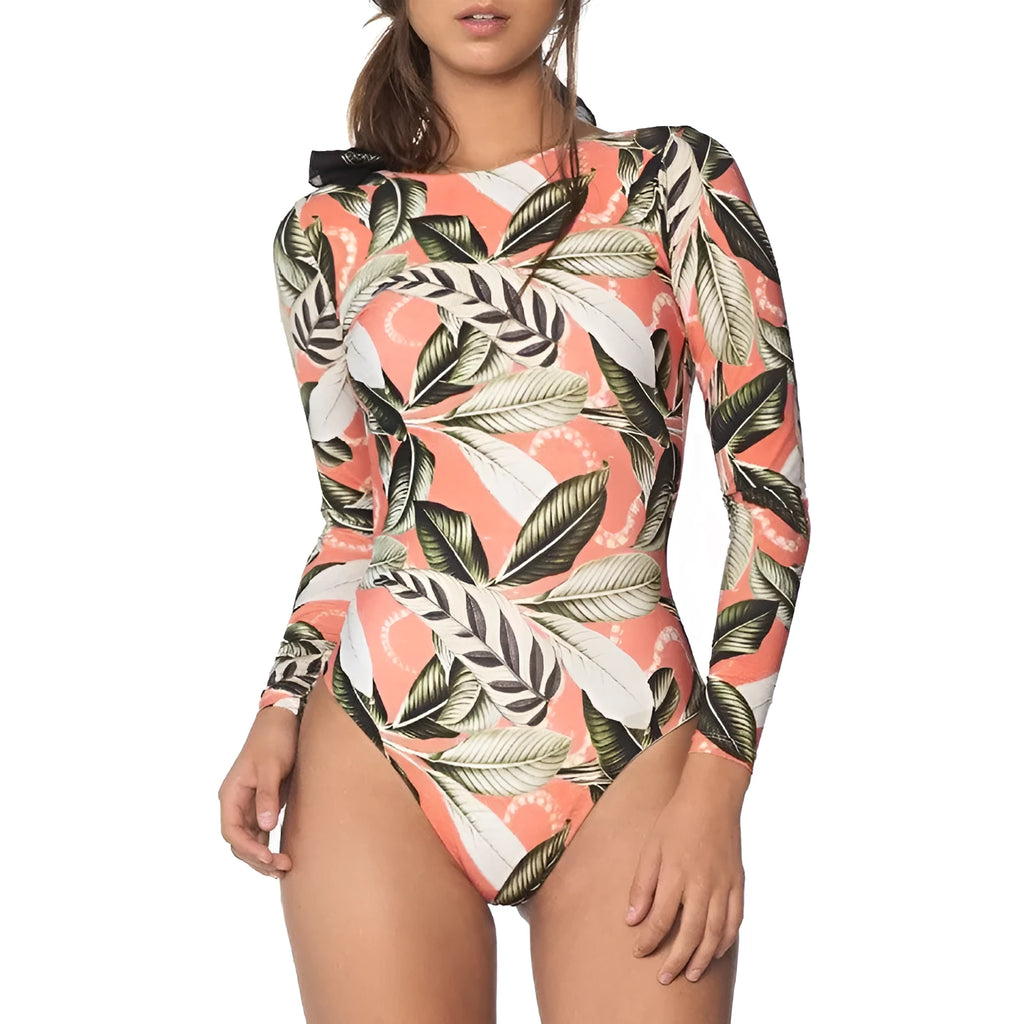 Women's green leaf print backless one-piece swimsuit on a mannequin.