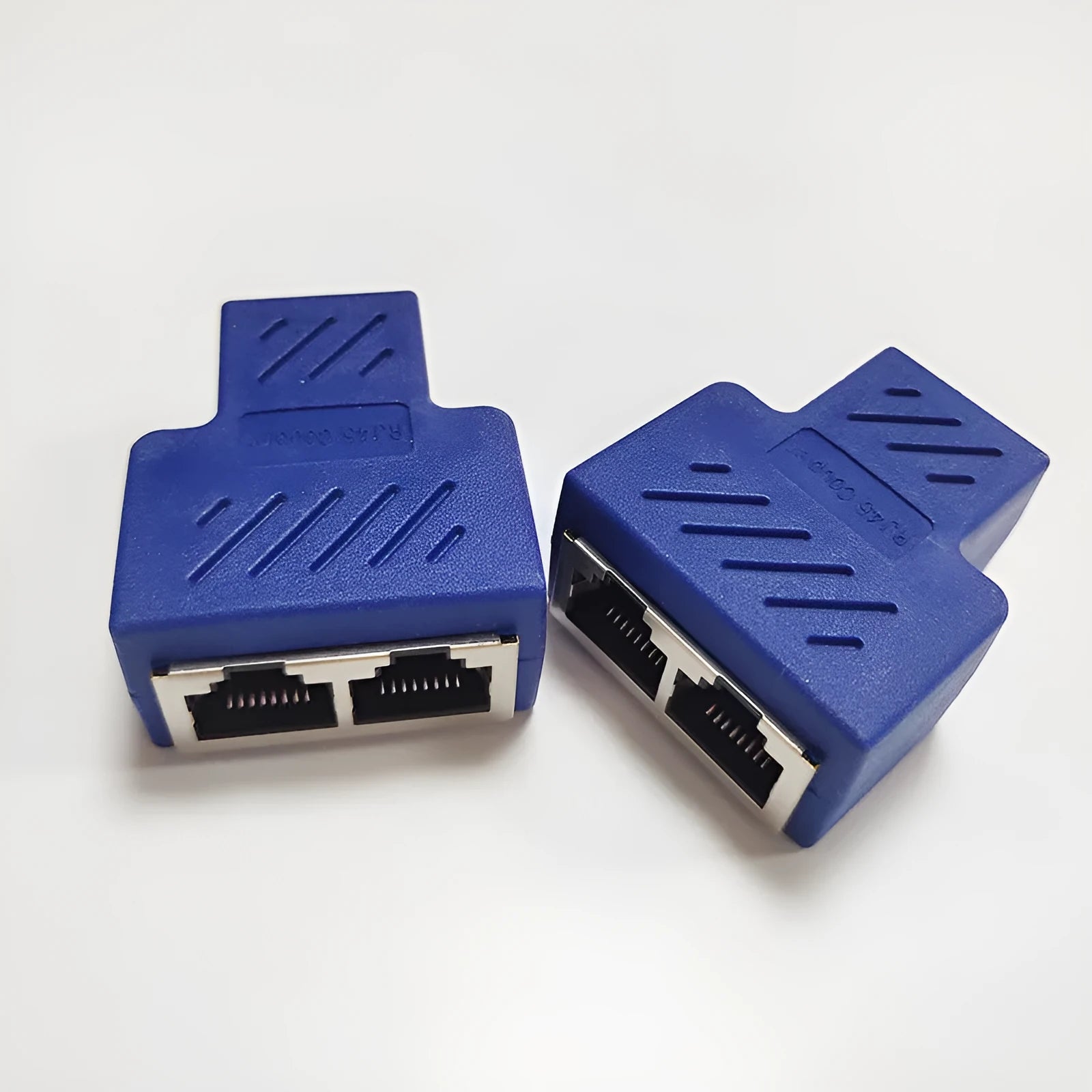 RJ45 network cable splitter adapter in multiple colours, showing one male and two female ports.